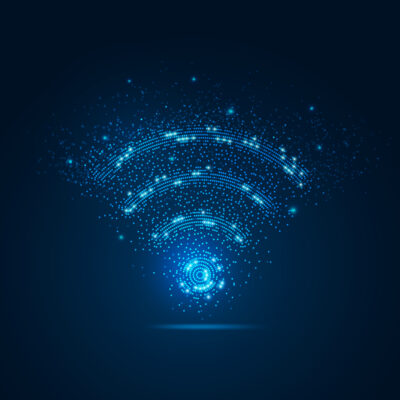 Digital glowing Wi-Fi symbol made of blue light particles, representing network management solutions from CMIT Solutions Atlanta